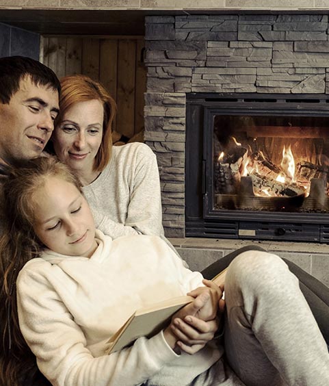 Happy Christmas family, Loving parents with child girl sitting