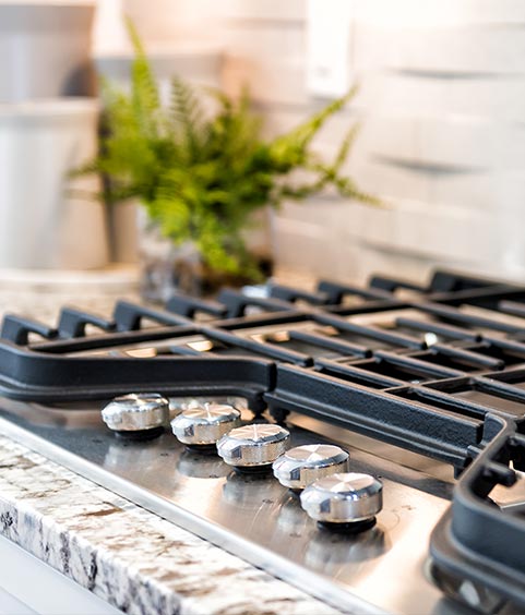 Macro closeup of modern luxury gas stove top